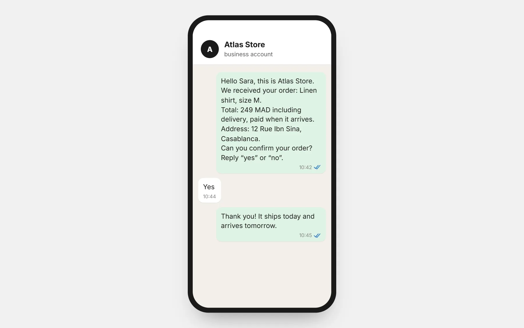 WhatsApp chat on a phone: a shop confirms a cash-on-delivery order with the product, total and address, and the customer answers yes